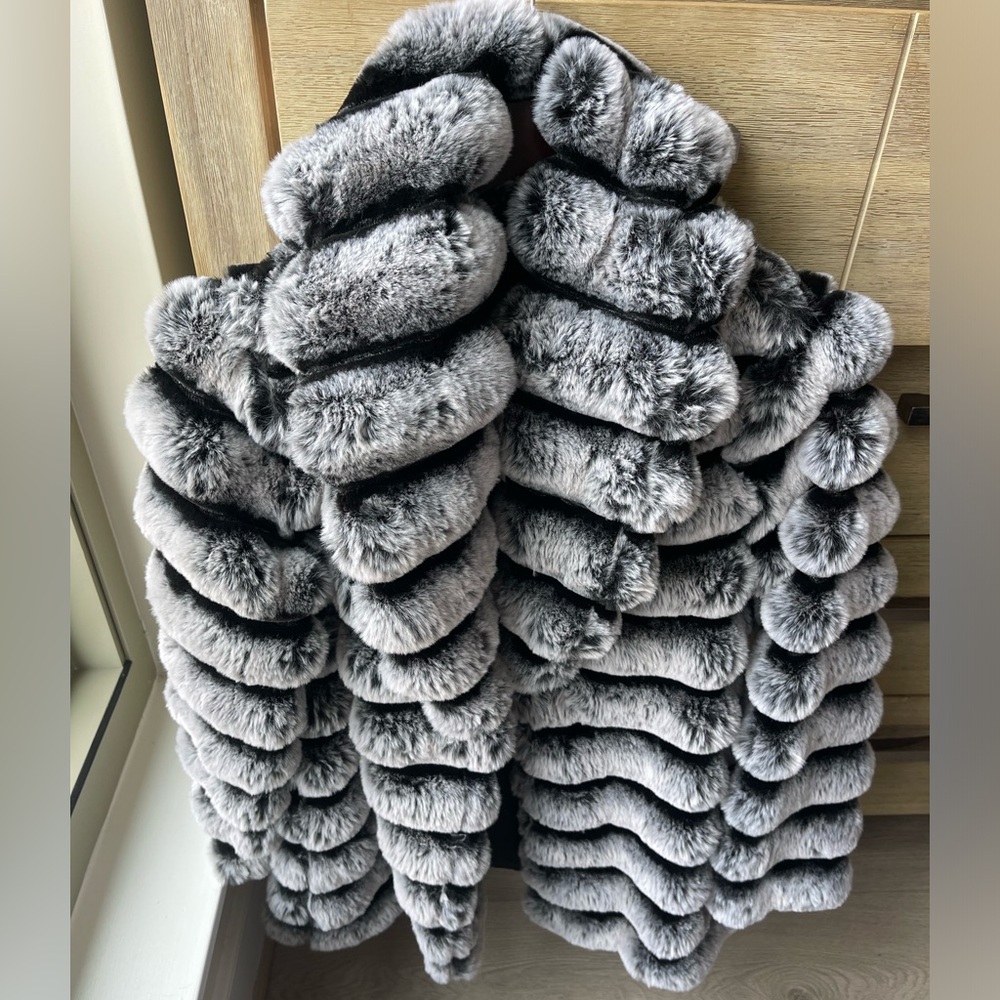 Faux chinchilla style coat. Size medium.